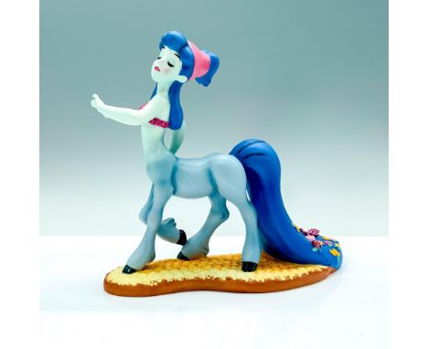 A porcelain figure of the blue Centaur from Disney's Fantasia striking a beauty pose. Walt Disney Classics Collection backsta
