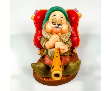 Ceramic in matte finish modeled as sleepy playing a tune before bed. Walt Disney Collection backstamp. This item has its orig