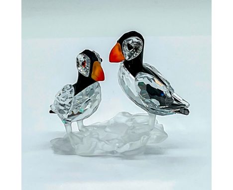 Part of the 'Feathered Beauties' group. A pair of puffins made from clear and black crystals with fire opal beaks. Perched on