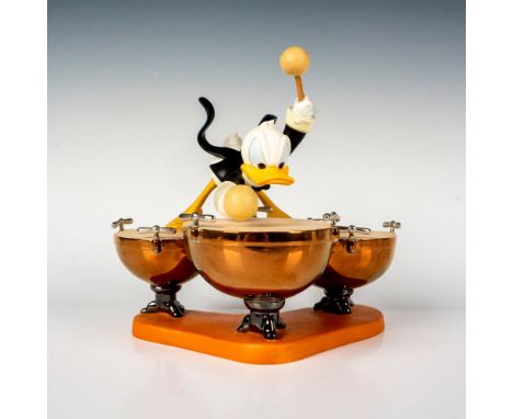 From the Disney Classic, Symphony Hour, comes this wonderful figurine of Donald Duck playing his heart out! This spectacular 