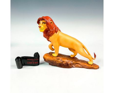 Ceramic figure and opening title in matte finish modeled as Simba perched on a big rock. Walt Disney Collection backstamp. Fi