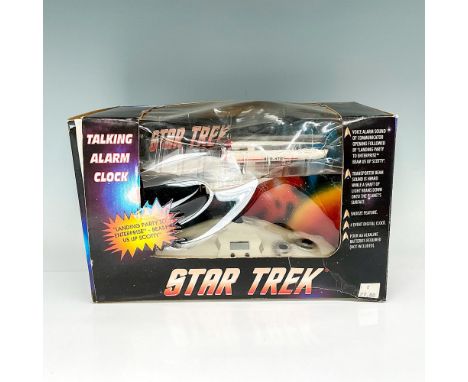 U.S.S. Enterprise model alarm clock with sounds featuring lines for the TV show. This item has its original box with measurem