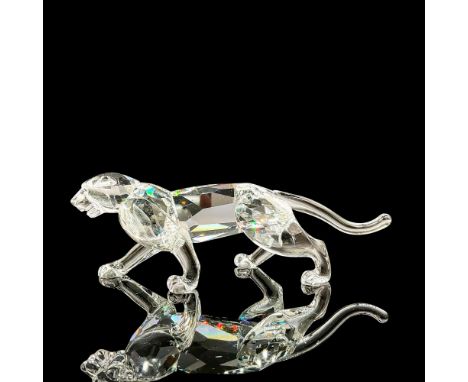 Part of the African Wildlife group. Cut crystal body with smooth tail and yellow inset eyes. Swarovski backstamp. 7610 000 00
