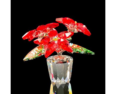 Clear cut crystal base with red crystal flowers. Green crystal leaves have silver underlay. Swarovski backstamp. This item ha