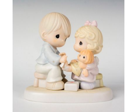 Features a father fixing his daughters doll. Precious Moments backstamp. This item has its original box. Box measures: 5.5"L 
