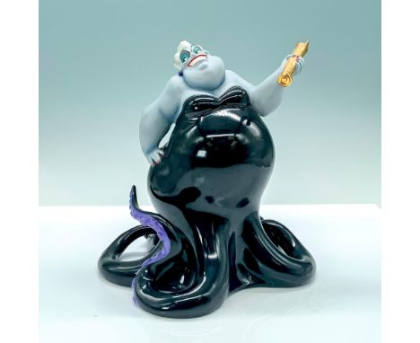 A porcelain figure of Ursula holding her wrapped up contract from Disney's The Little Mermaid. Walt Disney Classics Collectio