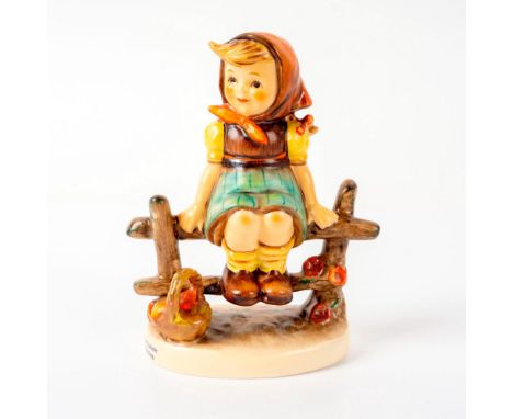 Figure of a sweet child resting on a fence with her basket alongside. Small flower detailing on the other side of her. This i
