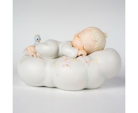 Features a baby boy sleeping peacefully on a cloud. Precious Moments backstamp. This item has its original box. Box measures: