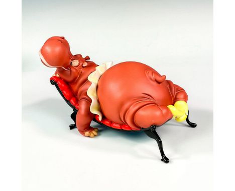 Ceramic in matte finish modeled as Hyacinth Hippo relaxing on her lounge chair. Walt Disney Classics backstamp. This item has