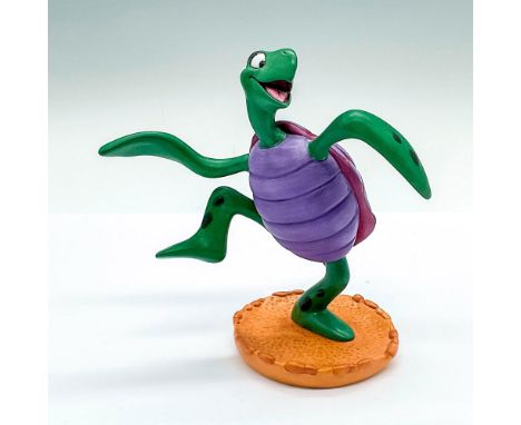 Porcelain figure with matte finish. Depicts the dancing sea turtle from the 1989 animated musical film, The Little Mermaid. W