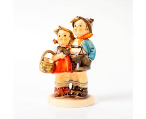 Figurine of the traditional storybook characters staring afar with a surprised look on their faces. This item has its origina