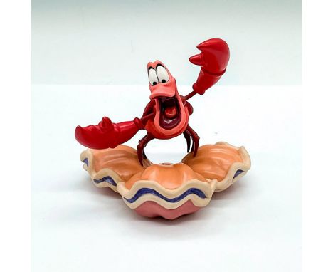Porcelain figure with matte finish. Depicts Sebastian from the 1989 animated musical film, The Little Mermaid. Walt Disney Co