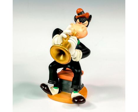 Ceramic in matte finish modeled as Horace elegantly dressed, playing the trumpet. Walt Disney Collection backstamp. This item