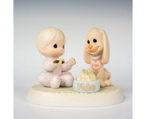Featuring a little girl feeding her pup. Precious Moments backstamp. This item has its original box. Box measures: 5.25"L x 3