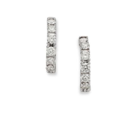 A pair of diamond earrings Each hoop set to the front and inside back with a line of brilliant-cut diamonds, post fittings(Le