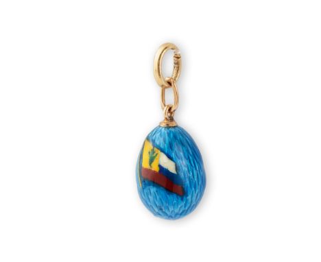 An early 20th century Russian enamelled egg pendant, circa 1914-17 Enamelled in light blue guilloché enamel and with the flag