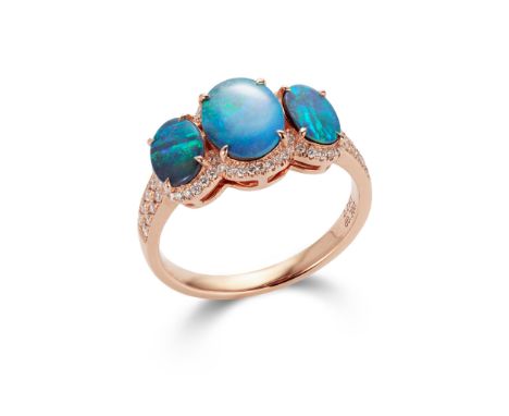 An opal and diamond three-stone ring Set with three oval boulder opals within a brilliant-cut diamond surround and shoulders(