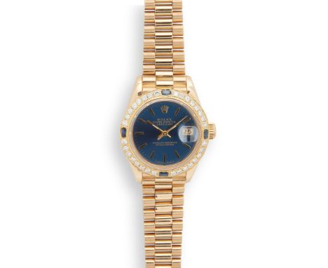 Rolex: a lady's gold wrist watch Oyster Perpetual Datejust model 69178, 1991 from serial number, round blue dial with applied