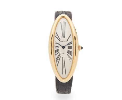 Cartier: a gold wrist watch Baignoire Allongee model, 18ct gold case, manual wind movement, elongated white oval dial signed 