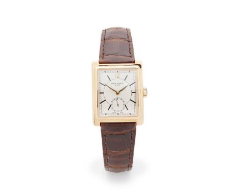 Patek Philippe: a gentleman's gold watch Gondolo model, 18ct gold case, manual wind movement, rectangular dial with 12 in gol