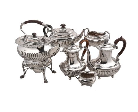 A matched Victorian silver six piece oblong baluster tea service, the kettle on stand by Maxfield & Sons, Sheffield 1899, wit
