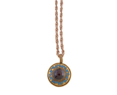 A late Victorian garnet and enamel pendant, circa 1900, the central circular cabochon garnet within a blue enamel ivy leaf su
