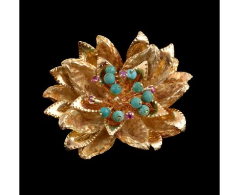 A 1960s turquoise and ruby flower head brooch, set with a cluster of turquoise beads and circular cut rubies, within a surrou