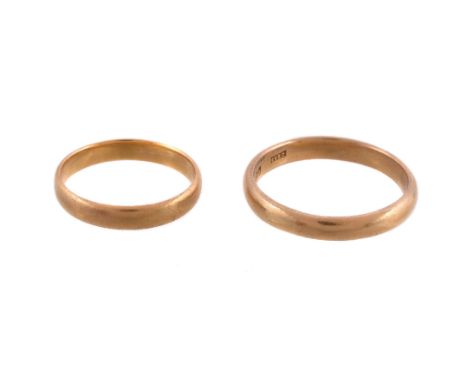 Two 22 carat gold band rings, finger sizes L and R 1/2, 7.3g gross