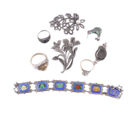 A small group of jewellery, to include: a blue paste and white paste set ring, finger size J; a white paste single stone ring