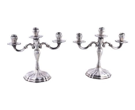 A pair of Italian silver coloured three light candelabra by Bruno & Cesare Zaramella, Padua 1944-68 .800 standard, lobe mould