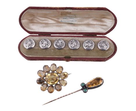 A citrine flower head brooch, the central oval cut citrine within a surround of further oval cut citrines, 4.4cm wide; a set 