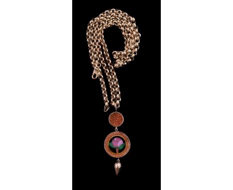 A late Victorian goldstone glass pendant, the circular panel with an inlaid flower to a goldstone glass border, below  a circ