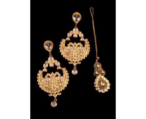A pair of Indian diamond ear pendants (Jhumka), the pierced pear shaped panels with two kundan polki diamond set parrots and 