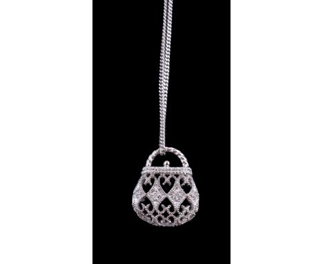 A diamond set handbag pendant, the pierced handbag set with eight cut diamonds, on a curb link chain, stamped 750 with Italia