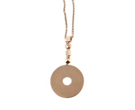 A gold coloured necklace by Bulgari, the polished disc below squared and circular connectors, stamped with Italian control ma