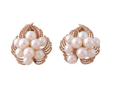 A pair of 1970s cultured pearl ear clips, the cluster of cultured pearls within a ropetwist surround, with clip fittings, sta