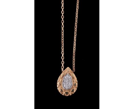 A diamond pendant by Tous, the pear shaped pendant with a cluster of brilliant cut diamonds, approximately 0.07 carats total,