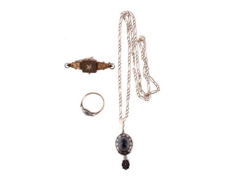 A Victorian enamel and onyx pendant, the oval banded onyx within a black enamel surround, suspending a black enamelled drop w