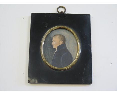 Finely painted portrait miniature of Georgian gentleman sideways on within an ebonised frame