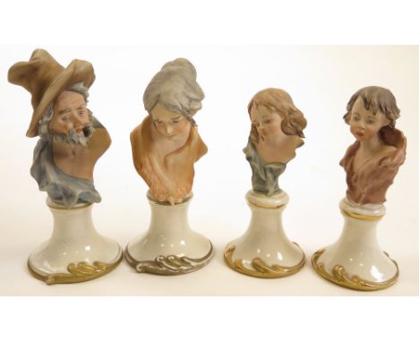 Four pieces of continental bisque porcelain shaped as head and shoulders statutettes mounted on plinths