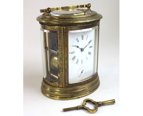 Fine19th Century gilt brass oval carriage clock, with five glass case engraved with swags, the white enamel dial alarm, lever