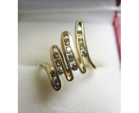 14ct Diamond set Ladies Ring size K weight 3.7 grams