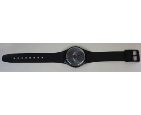 Large swatch advertising wall clock in the form of a wrist watch. 31 cm across face dated 1987