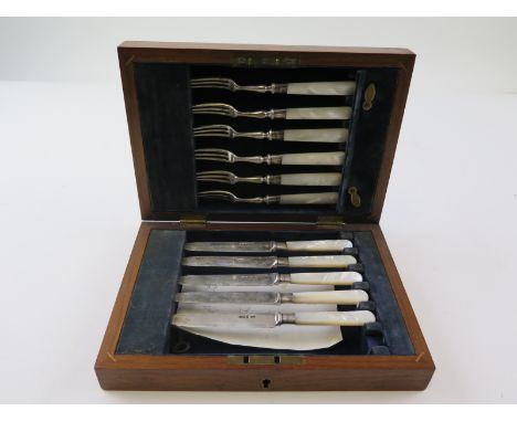Cased set of Silver fruit knives and forks with Mother of Pearl handles by John Y Cowlishaw of Sheffield 1921 missing one kni