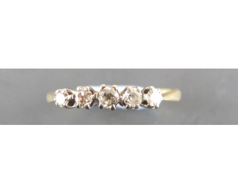 18ct gold diamond ring, the band set with a row of five diamonds, ring size R, approx 2.5g