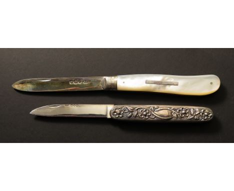 Silver Penknife, hallmarked birmingham 1901 along with a mother of pearl handle fruit knife with the blade being hallmarked S