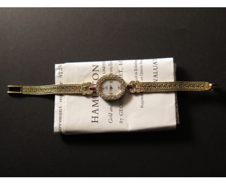 Ladies 18ct gold Omega quartz wristwatch. Mother of pearl dial with four diamonds set at 12, 3, 6 & 9 o'clock. The octagonal 
