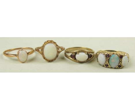 Lot of four Opal set Rings all 9ct Gold weight 10 grams