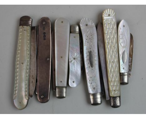 Six mother of pearl fruit knives with silver blades along with one silver penknife.