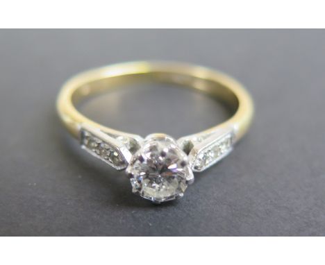 18ct/Platinum Solitaire Diamond Ring with diamond set shoulders stone approx 0.50ct size P